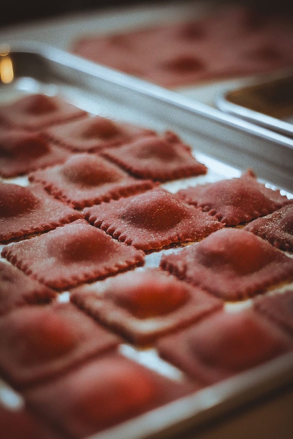 Fresh handmade ravioli dusted with flour